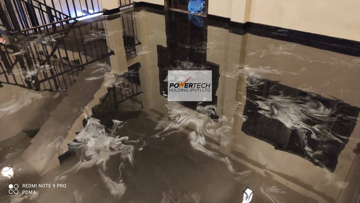 epoxy flake floor with helicopter in storage