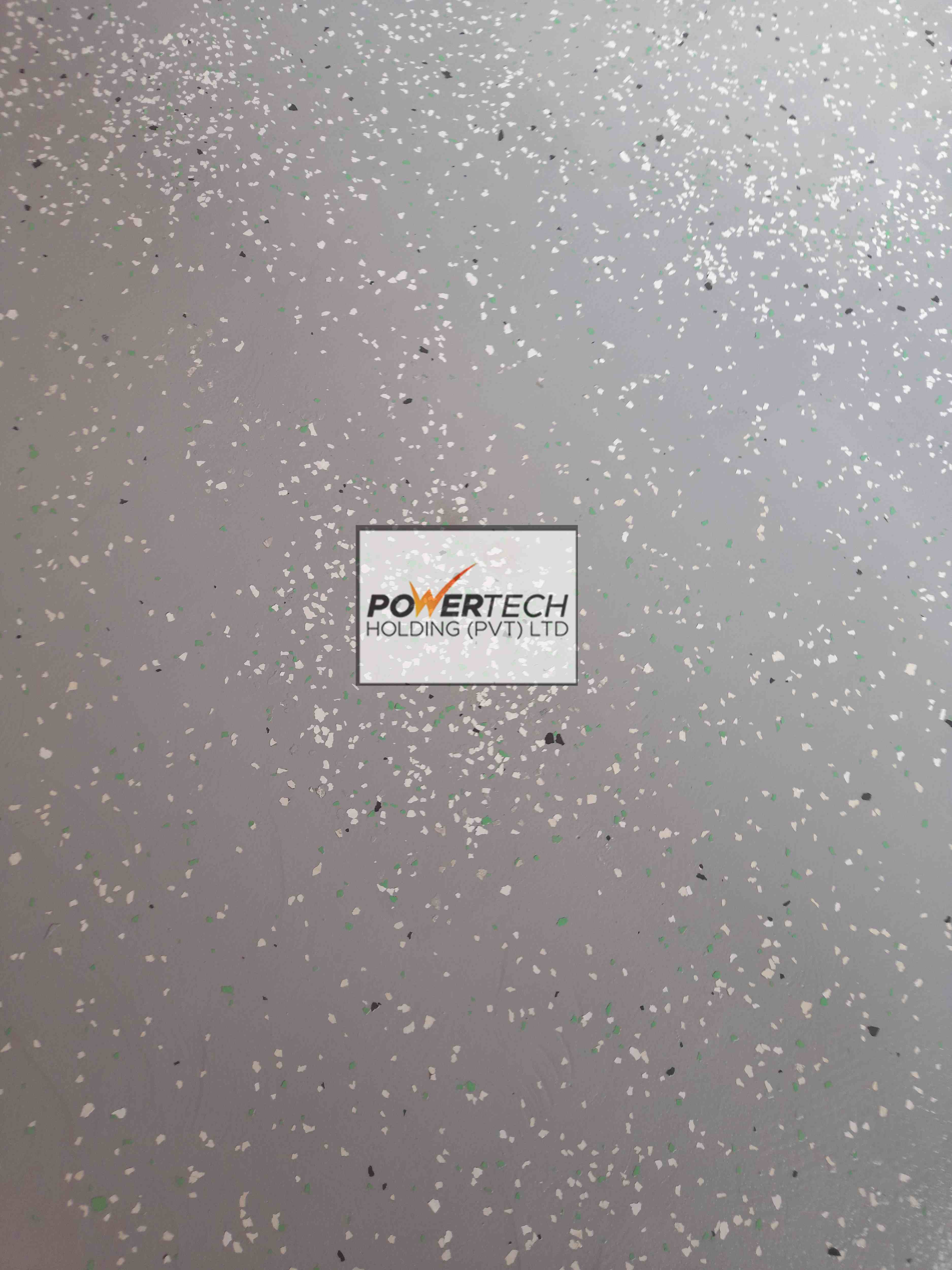 epoxy flake floor with helicopter in storage