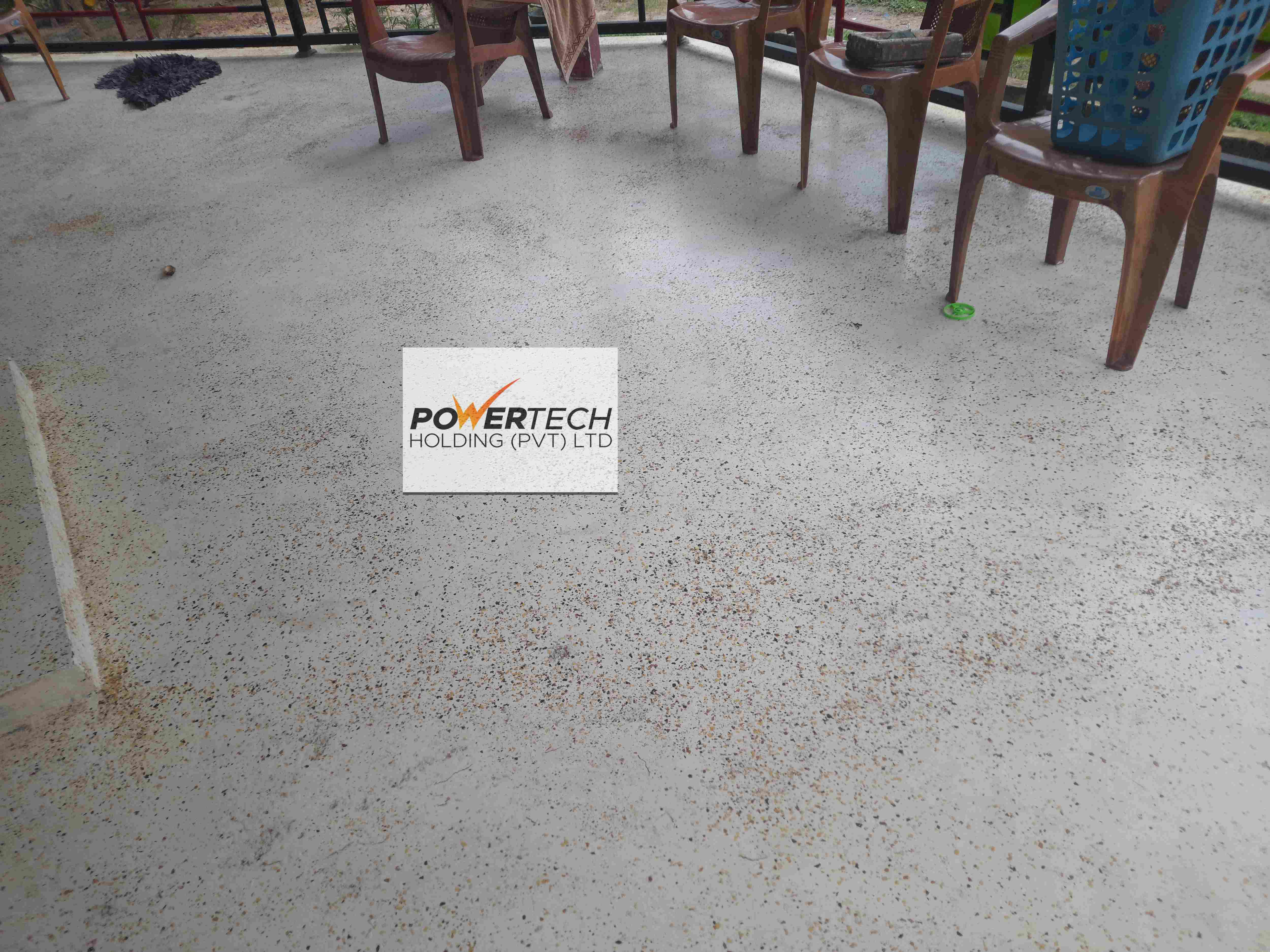 epoxy flake floor with helicopter in storage