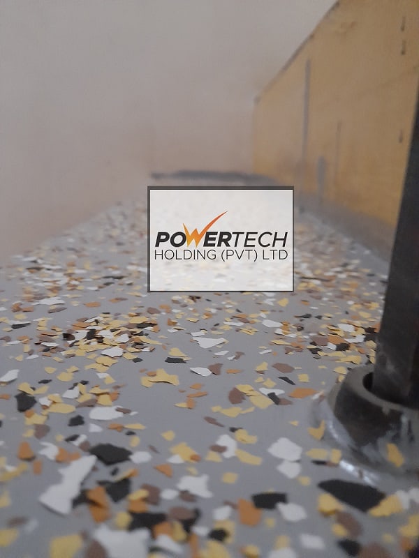 epoxy flake floor with helicopter in storage