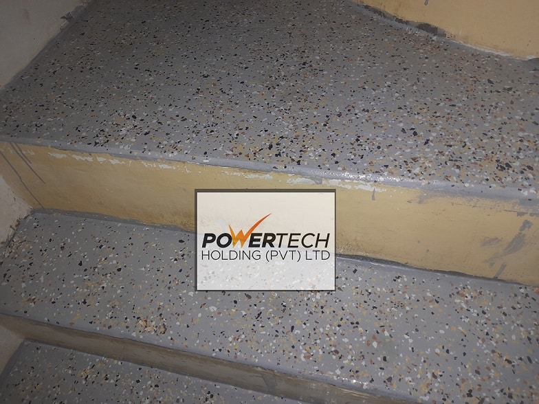 epoxy flake floor with helicopter in storage