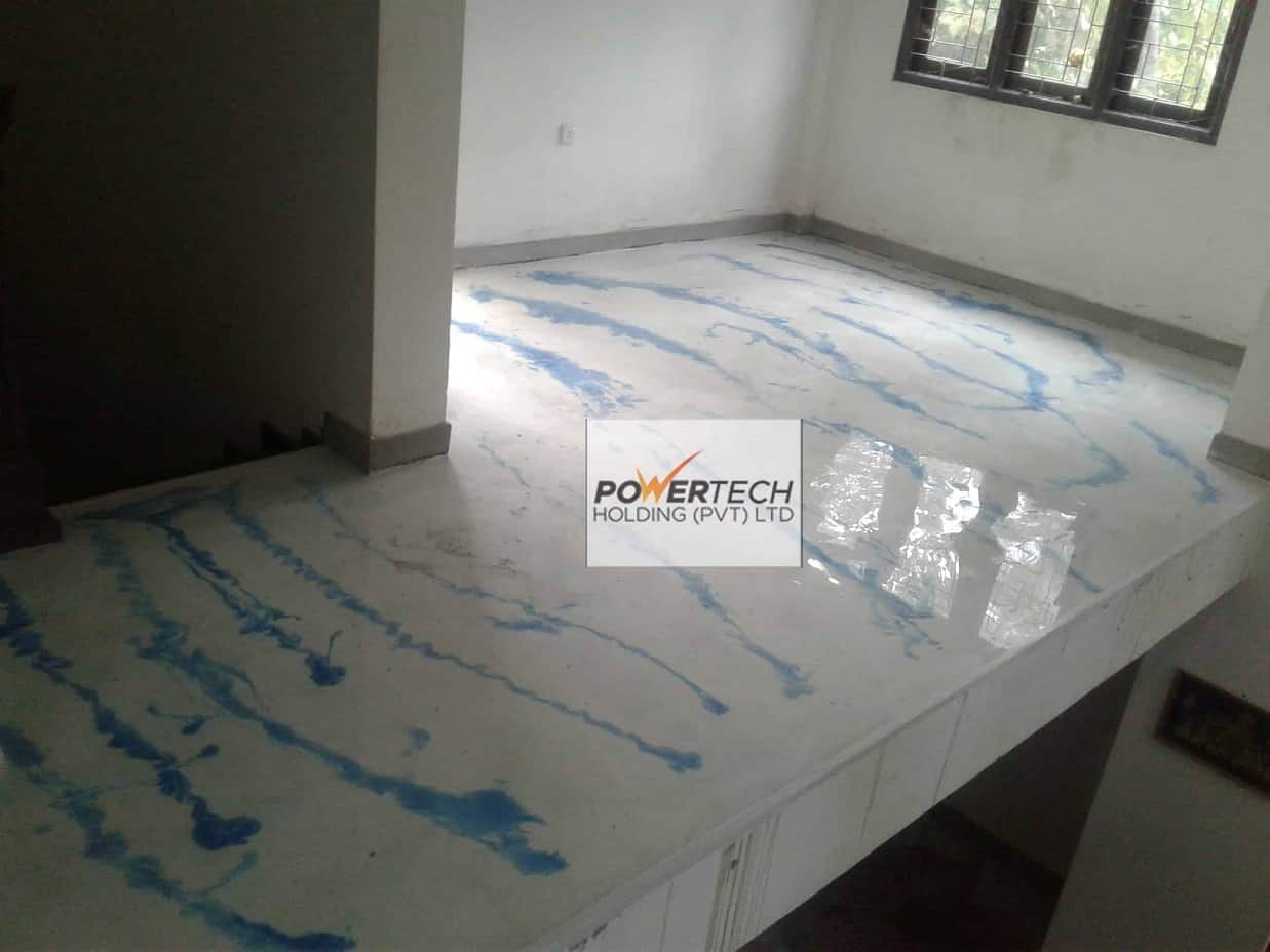 epoxy flake floor with helicopter in storage