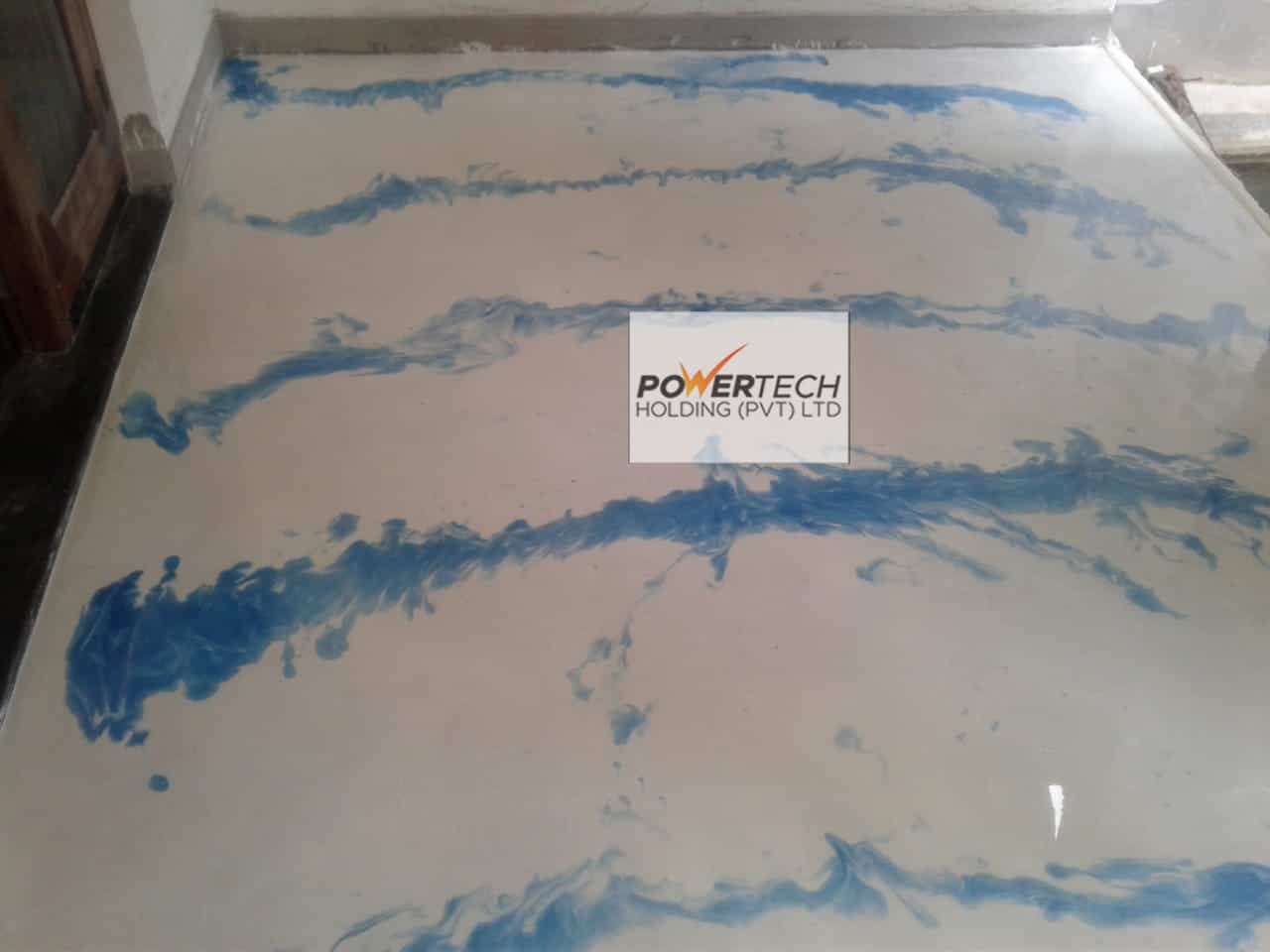 epoxy flake floor with helicopter in storage