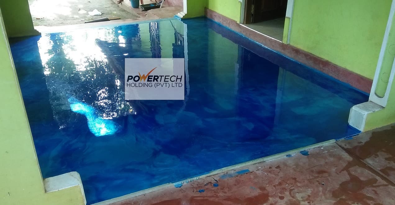 epoxy flake floor with helicopter in storage